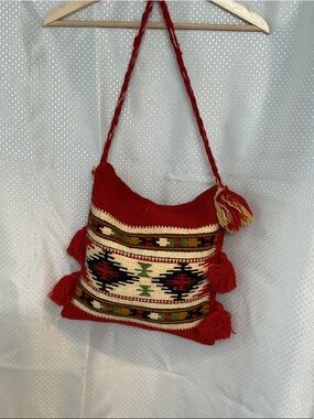 Handwoven Red Bohemian Shoulder Bag with Tassel Accents